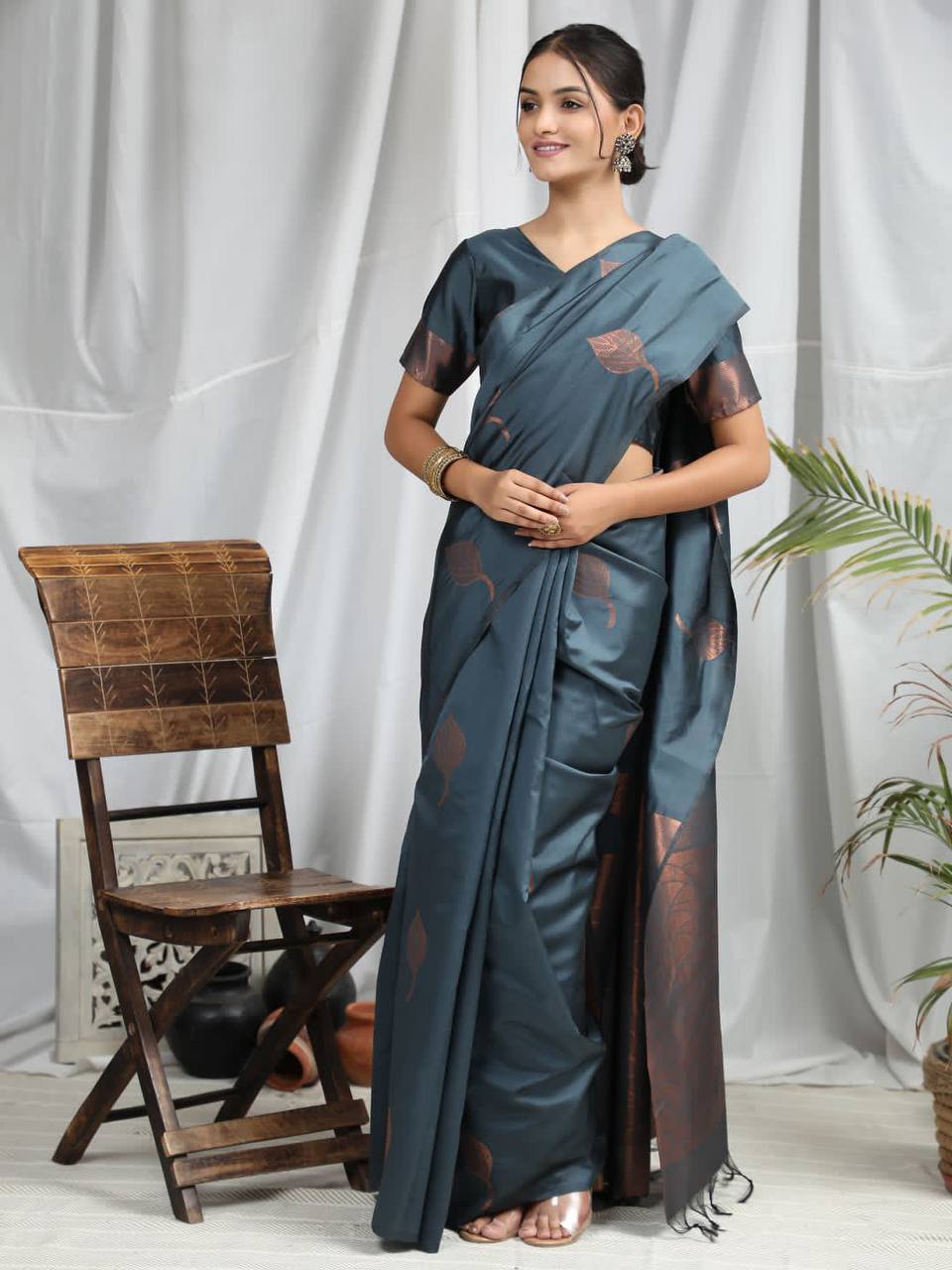Soft Silk Saree With Copper Zari Weaves Butties